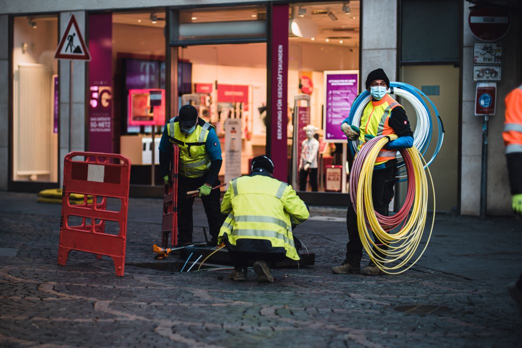 technicians installing broadband